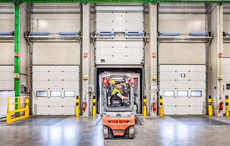 Spiral High Speed ​​Door kumpara sa Sectional Door: Alin ang Mas Mabuti para sa mga Industrial Building?